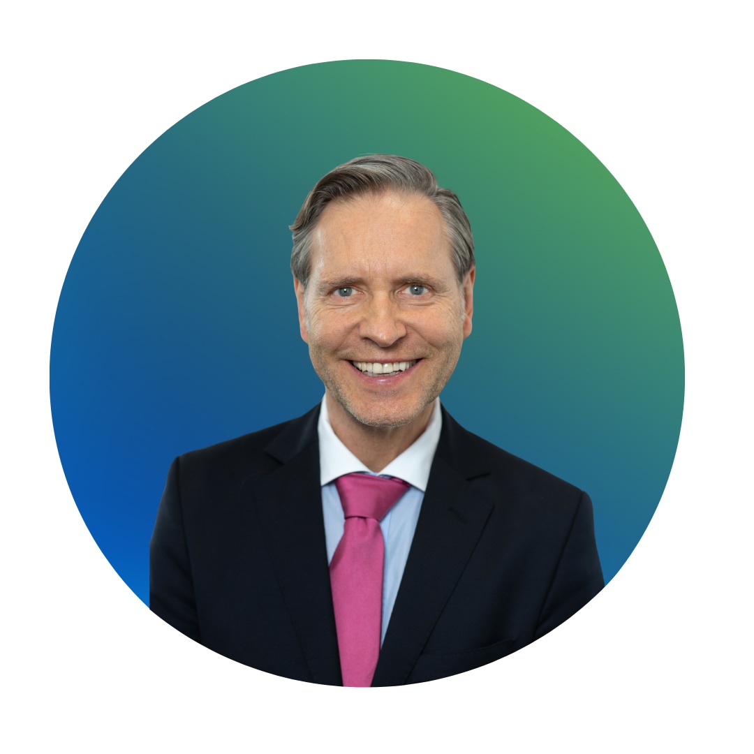 Rundes Icon mit blau grünem Farbverlauf und Konterfei von medizinischem Prüfer Dr. Uwe-Phillip Strauss